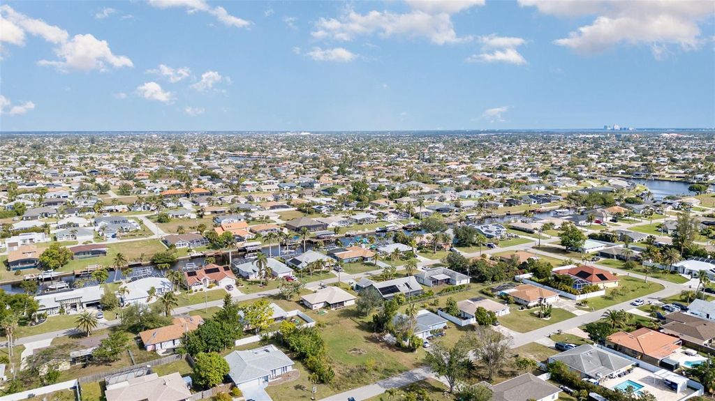 Photo of 317 SE 32nd Terrace, Cape Coral, FL 33904 (MLS # TB8342958)