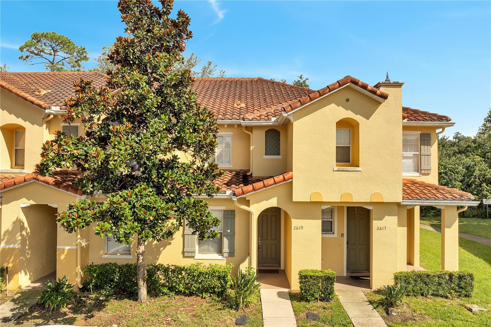 Welcome to this fully furnished 3-bedroom, 3-bathroom townhome nestled in the gated community of Crestwynd Bay. This move-in-ready home offers a durable tile roof, a private concrete patio, and the rare bonus of no rear neighbors—just peaceful green conservation views for added privacy and tranquility. Inside, you'll find a spacious layout perfect for personal use or short-term rental. The HOA includes exterior maintenance, basic cable, internet, trash service, and access to community amenities like a pool and playground. Ideally located just minutes from Walmart, Disney World, and major resorts, with quick access to I-4, Osceola Parkway, Highway 192, and the 429 toll road, this home offers both comfort and convenience. Whether you're seeking a primary residence, vacation retreat, or investment property, this townhome delivers value and location in one.