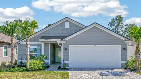 Photo of 79 Green Cir, Palm Coast, FL 32164 (MLS # FC310097)