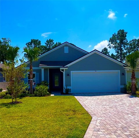 Photo of 79 Green Cir, Palm Coast, FL 32164 (MLS # FC310097)
