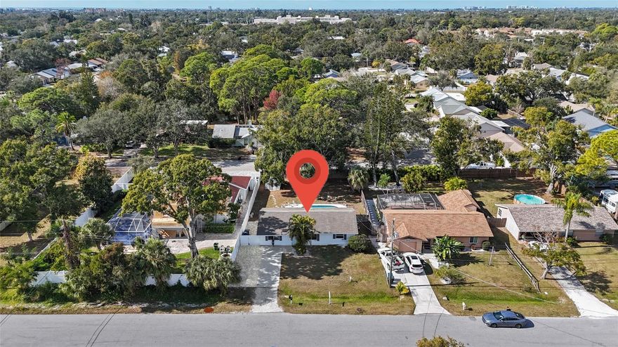 This home is priced to MOVE QUICKLY! DON'T MISS THIS OPPORTUNITY to own a move-in ready home in the heart of SARASOTA! No HOA. Great INVESTMENT OPPORTUNITY or STARTER HOME! This charming 3-bedroom, 2-bathroom ranch-style pool home is perfectly situated in a quiet, established neighborhood just minutes from top-rated Riverview High School. HUGE BACKYARD! Just waiting for you and your family! Plenty of room to build a garage or just enjoy the beautiful trees and POOL! Fully fenced yard provides privacy and safety for pets. Just around the corner from public park RED BUG SLOUGH.
Designed for the classic Florida lifestyle, this home features a bright and airy open floor plan with seamless flow from the living areas to the outdoor space. The heart of the home is the spacious combined family room and dining area—ideal for hosting family gatherings.
Step through the back doors to your private tropical oasis. The large yard features a sparkling swimming pool, providing a secluded space for year-round relaxation or weekend BBQs. The expansive, fenced-in backyard offers plenty of room for pets and play.
Key Features:
NEW ROOF! New Hurricane impact-resistant windows 2023.
FRESH PAINT inside and out! including driveway coating. 
Updated LVL flooring in bedrooms. 
Huge backyard with a beautiful pool just waiting for you! 
Ceramic tile in main living, dining and kitchen area. NO CARPET! 
Prime Location: Less than a 5-minute drive to Riverview High School and close to Gulf Gate Elementary, Phillippi Shores Elementary and Wilkinson Elementary.
Convenience: Situated near the Proctor and Beneva corridor, you are minutes away from Publix, local dining, and the Landings Shopping Center.
Outdoor Living: Pool and private backyard.
Beach Access: Only a 10-minute drive to the world-famous Siesta Key Beach.
Whether you are looking for a move-in-ready family home or an investment property in a high-demand school district, this Sarasota gem offers the perfect balance of location and lifestyle.
Schedule a private showing to view this property today.