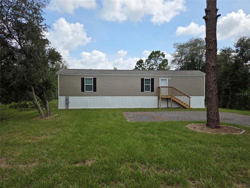 Photo of 9448 Rousseau Street, Webster, FL 33597 (MLS # G5115727)