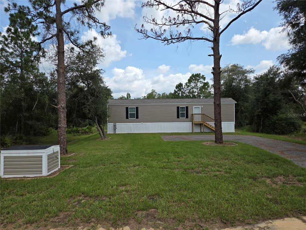 Photo of 9448 Rousseau Street, Webster, FL 33597 (MLS # G5115727)