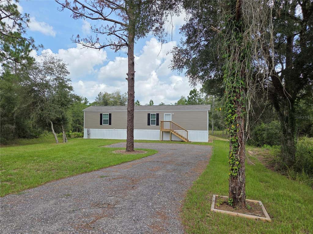 Photo of 9448 Rousseau Street, Webster, FL 33597 (MLS # G5115727)