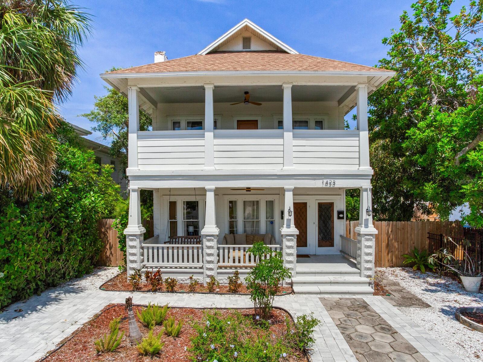 Investors or house-hackers! This is a must-see, beautifully renovated multi-family property located in the highly desirable Crescent Lake area of St Petersburg. This exquisite duplex offers two spacious 2 bed/1 bath units along with a detached 3-car garage, presenting a prime investment opportunity, as the property is currently zoned to construct up to 4 units. Currently bringing in $63,000 of rental income annually with long-term tenants in place. This historic home was fully renovated in 2022 up to today's standards. Upgrades included a new roof, new HVAC, new gas water heaters, new electrical throughout and plumbing updated as well. The kitchens in both units feature charming and modern updates including new cabinetry and new appliances. Open shelving and updated backsplashes add a touch of contemporary style. The bathrooms have been refreshed with new vanities while preserving the original tile and refinishing the cast iron tubs, highlighting the home's historic charm. Endless windows throughout both units let in the natural light complemented by stunning window treatments. The backyard features a shared laundry space in a covered area attached to the garage, and an expansive backyard perfect for entertaining! Both units also offer large front porches, ideal for relaxing with a morning coffee or evening drink. This exceptional property is a rare find and outstanding investment opportunity. Don’t miss the chance to make this stunning duplex your new venture!