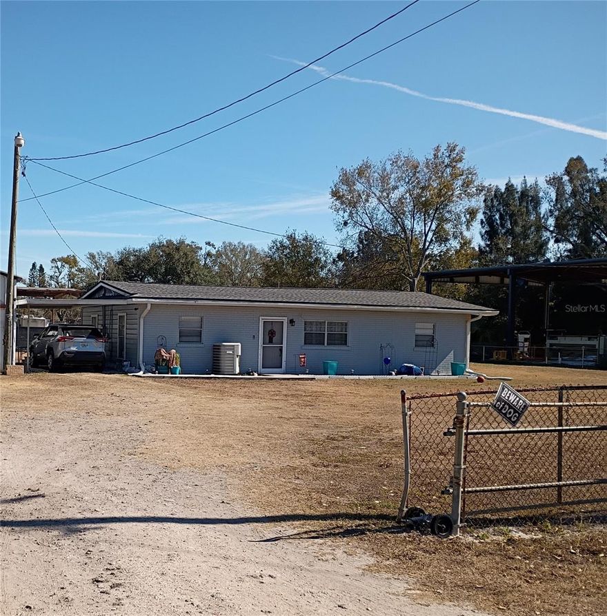 Beautiful lot No HOA or CDD. Bring your Toys, boats, Rv's, Tucks and equipment, some animals can be raised or kept on property... Possibilities are endless. Home did have Flood damage water damage from the last Hurricane. Home is beeing sold As Is. Room dimensions need to be varified by buyer.
