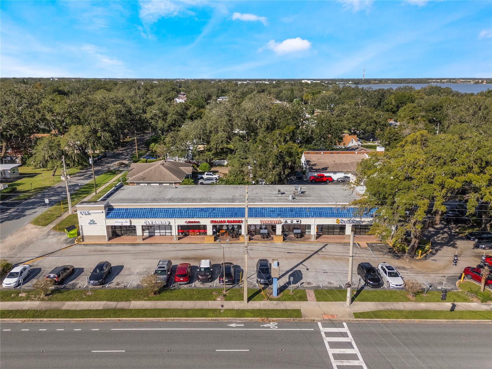 The Oaks shopping center located in the Business District of College Park, offers a mix of retail and office space. With multiple long-term tenants, this well-maintained building provides a stable income stream with substantial value add opportunity. This building offers 8 units with 5 current tenants fully occupying the leasable space. Tenants are responsible for interior buildouts, offering flexibility for customization. The property enjoys a prime location, situated directly across from Bishop Moore High School and near Edgewater High School. Frontage on Edgewater Dr and entrances on Arthur Ave and Webster St provide convenient access. Zoned MU-1/W/RP/SP/AR, the property allows for various commercial uses. Built in 1985 and updated since, this property features 9,867 square feet of leasable area and an additional 1,248 square feet of canopy area, totaling 11,115 square feet