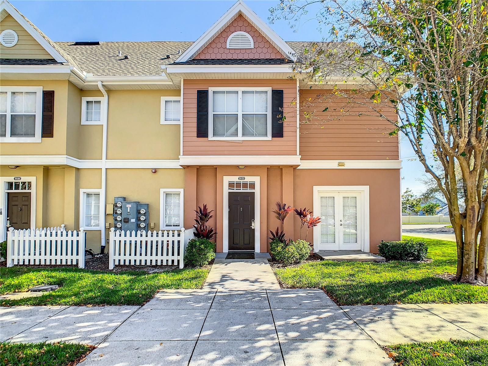 Welcome to this charming 4-bedroom, 3-bathroom townhome located in the exclusive Venetian Bay Community! The property has recently been updated in the kitchen and bathrooms, featuring brand new high-end kitchen cabinets and quartz countertops. This property is a rare find and offers a perfect blend of elegance and functionality. With two master suites, an inviting open floor plan, a luminous main living and dining area, high ceilings, and an open kitchen with a breakfast bar, this home is truly exceptional. The home features updated fixtures that add a modern touch, enhancing its overall appeal. With its prime location just a short drive from I-4 and Florida's Turnpike, you get the best of both worlds—a beautiful home in a convenient location. It's ideally situated just 14 miles from Disney and a short drive from other Orlando-area theme parks. Creating unforgettable family memories is easy here. Nestled in a private gated community, you'll enjoy access to numerous amenities, including a hot tub, four swimming pools, a spacious clubhouse, barbecue and picnic facilities, a fitness center, and more. Don't miss out, make sure you come see this property before it's gone. Please note that all furniture is not included. Don't wait! Claim this truly remarkable townhome and start enjoying the Florida lifestyle today.