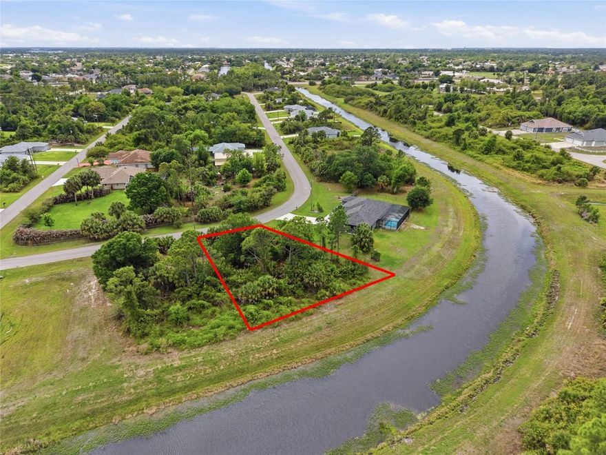 Seize the opportunity to build your vision from the ground up on this waterfront property located along the Fordham Waterway in the fast-growing city of North Port. Positioned on Sawyer Circle within an up-and-coming subdivision, this property offers scenic water views and added privacy, creating the perfect backdrop for your future build. Recently rezoned to **AC10 (Activity Center 10)** under current city ordinance, this property presents a unique opportunity for a variety of uses beyond traditional residential development, including mixed-use projects, professional or medical offices, small-scale retail, live/work concepts, or potential multi-family development (subject to approvals). Whether you’re envisioning a custom waterfront residence, an income-producing property, or a strategic long-term investment, this lot provides the flexibility to bring your plans to life. With ongoing new construction throughout the area, now is the perfect time to secure your place in one of Southwest Florida’s most rapidly expanding markets. Enjoy a convenient location just minutes from shopping, dining, and everyday essentials, while still maintaining a peaceful waterfront setting. Take a short drive to the Gulf Coast and explore nearby destinations like Manasota Key and Englewood Beach, or access Interstate 75 for easy commuting to surrounding areas. An additional parcel on the same street is also available (Parcel ID: 1152236516), offering even more potential to expand your footprint or investment portfolio—don’t miss your chance to capitalize on this versatile, waterfront opportunity.