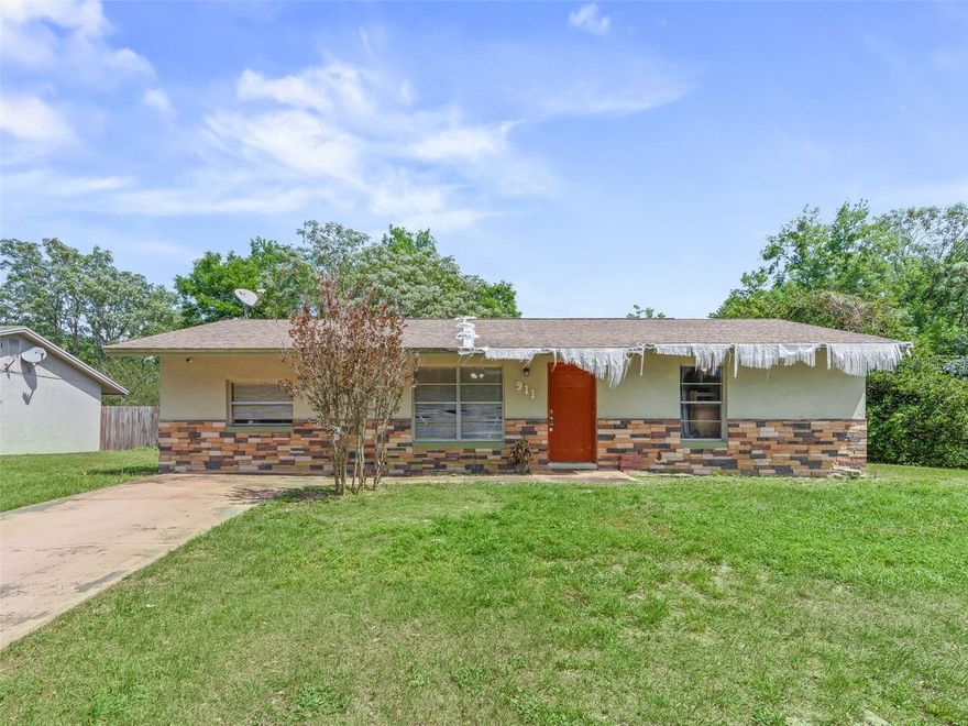 Welcome to this well-maintained home in the April Hills community of Lady Lake, featuring a brand-new roof coming soon. Located on a corner lot in an established neighborhood, this 3-bedroom, 1-bathroom home offers 1,175 square feet of practical living space.

Built with block and stucco construction and brick accents, the home provides durability and low maintenance. The living room features laminate flooring and flows into the dining area with a chair rail detail.

The kitchen includes granite countertops, an undermount sink with a new faucet, oak cabinets, tile backsplash, pantry closet, tile flooring, and stainless steel appliances.

The split-bedroom layout offers privacy, with three well-sized bedrooms. The bathroom has a granite vanity and tiled shower. An indoor laundry room with tile flooring and cabinet storage adds convenience.

The covered lanai overlooks a fenced backyard, suitable for outdoor use, pets, or gatherings.

Recent updates include a new water heater and plumbing improvements.

Located close to shopping and just minutes from The Villages, with access to dining, golf, and medical facilities.

Schedule a showing to see this home.