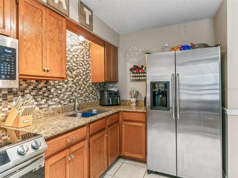 Tiny photo for 911 Jacaranda Drive, Lady Lake, FL 32159 (MLS # OM721984)