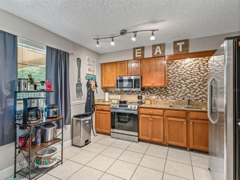 Tiny photo for 911 Jacaranda Drive, Lady Lake, FL 32159 (MLS # OM721984)