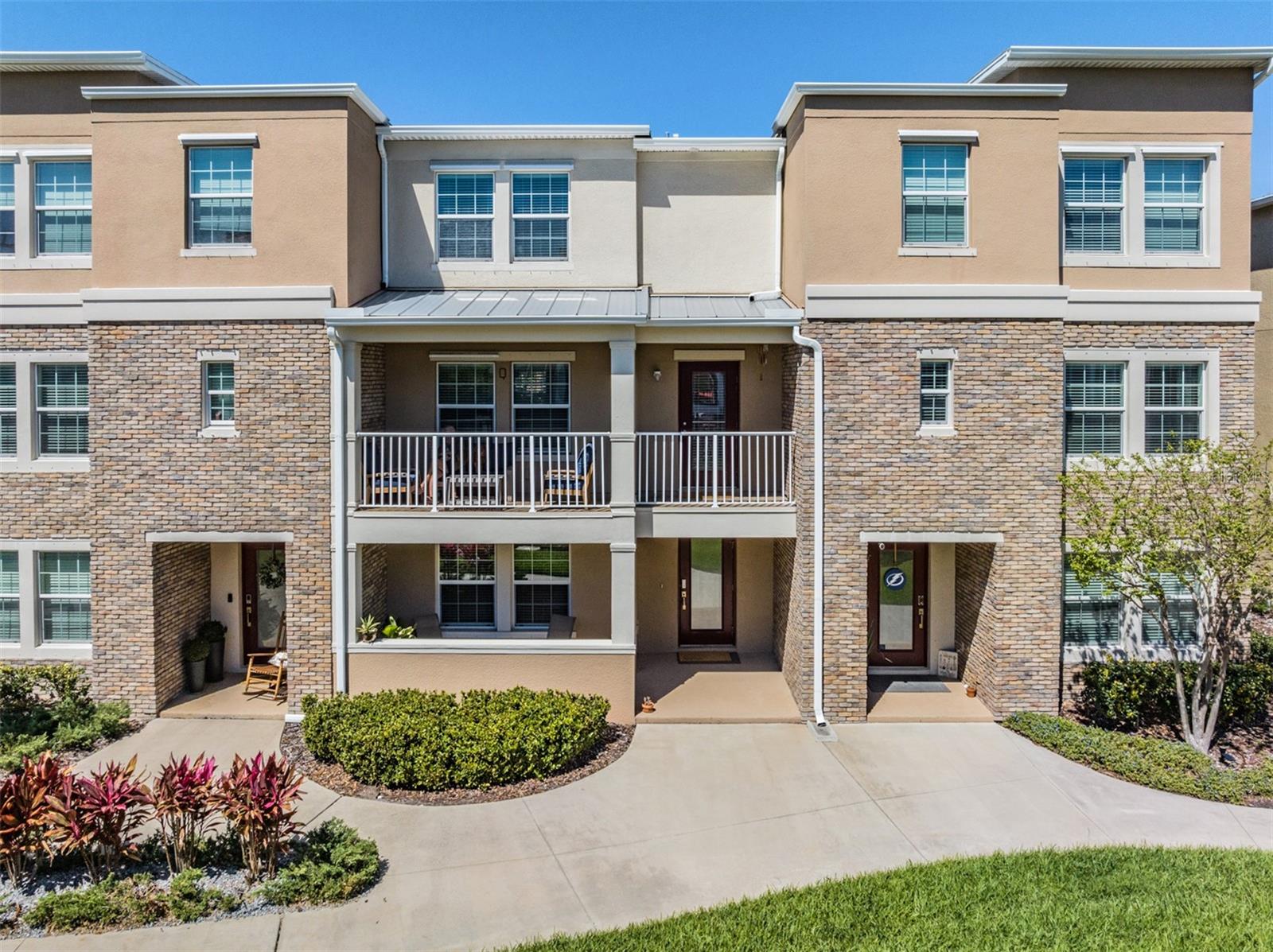 Experience urban living in the epicenter of Tampa, surrounded by award-winning restaurants, shopping and cultural opportunities in this turn-key, newer construction townhome. Property is offered partially furnished with one primary suite, living room, dining room and balcony chairs.
Located in the coveted Plant High School District and walking distance to the University of Tampa, this property offers diverse investment opportunites. Beautifully appointed and turnkey, you will enjoy a split floor plan, 3 bedrooms, 3.5 bathrooms, 2 car garage, front porch and 2nd floor balcony. One bedroom and bathroom on the 1st floor ideal for guests, roommates, or an in home office. The 2nd floor features high ceilings and spacious kitchen with 42" cabinets, quartz countertops, stainless steel appliances and wine fridge. Kitchen is the center of the second floor opening up to the living room and dining room. 2nd floor balcony and powder bath. The 3rd floor you will find the 2 large Owner's Suite bedrooms with spacious walk in closets, ensuite bathrooms and private loft area. This townhome has a private, gated courtyard area that offers picnic tables and outdoor grills. You are minutes away from everything the City of Tampa has to offer. Walk to The Straz Performing Arts Center, University of Tampa, The Tampa Riverwalk, Armature Works, Curtis Hixon Park, Michelin star neighborhood restaurants, bars and parks from this centrally located, downtown Tampa home. Call to schedule your private tour.