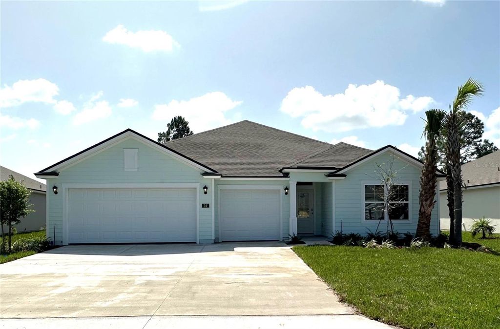 Photo of 54 Hulett Woods Road, Palm Coast, FL 32137 (MLS # FC292609)