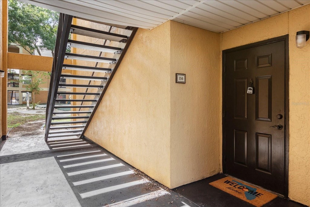 Photo of 7606 Pissarro Drive #104, Orlando, FL 32819 (MLS # O6453811)