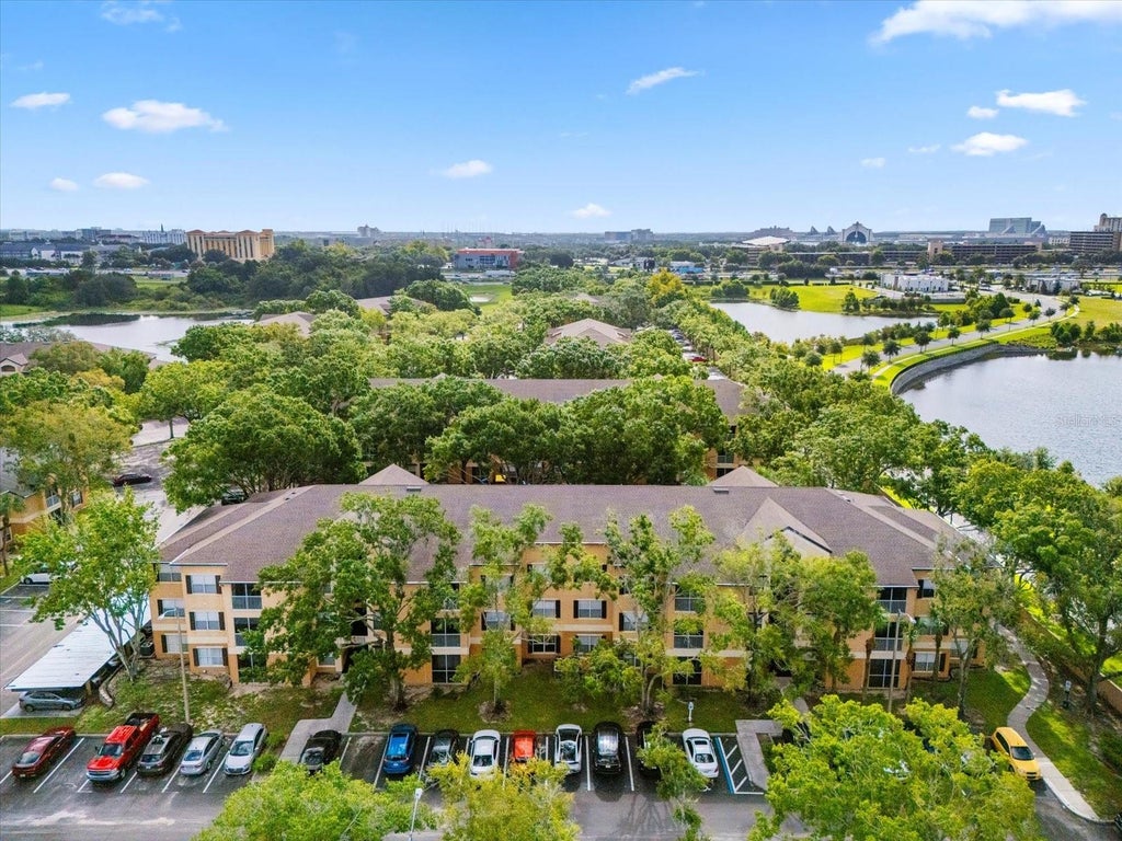 Photo of 7606 Pissarro Drive #104, Orlando, FL 32819 (MLS # O6453811)