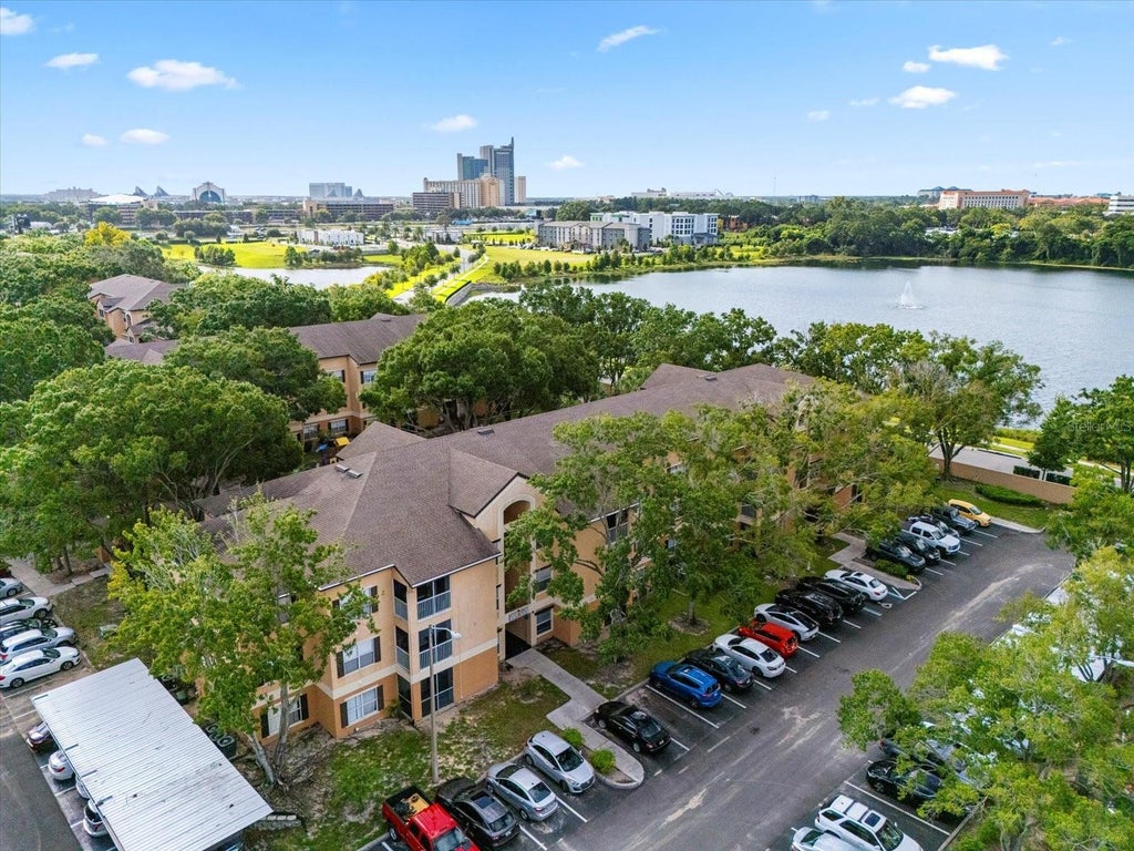 Photo of 7606 Pissarro Drive #104, Orlando, FL 32819 (MLS # O6453811)
