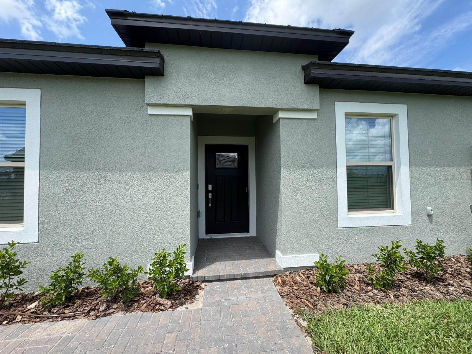 This is your chance to live in the most beautiful lagoon community that also has its own private club and extra amenities. You can play tennis or Pickleball, use the state of the art the gym and use the multi purpose fitness room for tai-chi, yoga, Zumba etc..such a great place to spend time at the heated oasis pool and do pool fitness, lap swims or engage all the activities such as walking or biking in the private trails that's around this beautiful 55+ community..On top of this you can use the biggest lagoon built for you and your family's entertainment..
It is such a great way do a Fresh Start at Mirada San Antonio's Premier 55+ Community. This brand-new villa-nestled in a peaceful, quiet neighborhood of S-Designed specifically for adults 55 and over. This special community offers the perfect blend of comfort, style, and active living.
The corner-lot villa offers both privacy and scenic views ideal for enjoying stunning sunrises and sunsets. When you enter this beautiful villa you will be embraced with a spacious living area in an open floor plan with a modern kitchen with stainless steel appliances, quartz countertops, light cabinetry, and a large island perfect for cooking and casual dining. The kitchen and living area open to the patio and a spacious yard which is always green in sunny Florida and well maintained just for you.
The master suite features a well-appointed bathroom and a generous walk-in closet which faces this lovely yard area, which is relaxing. The other room is spacious enough with a nice bathroom adjacent to it and is very convenient and comfortable for your guests. In this beautiful gem , you have a little Den where you can use as an office or for your hobbies. The one car garage has a connection from the house , from your laundry room.
The heart of the Mirada community is its 15-acre MetroLagoon the largest in the country offering year-round water fun right outside your door, though one of the tenants HAS TO BE 55 and over to be accepted in this community.
Less than 10 minutes away from I-75, there are so many activities you will enjoy like swimming, kayaking, paddle boarding, and sandy beaches. A sandbar with a swim-up area, food options, and private cabanas. There is also a floating obstacle course, water slides, and a splash park
Mirada offers you a Resort-style pool, Dog parks, tennis and pickle ball courts, walking and biking trails, bocce ball courts and many more.
Schedule your showing today—experience the Mirada lifestyle!