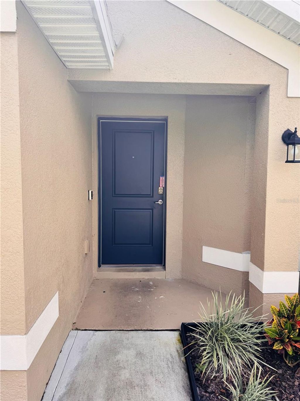 Photo of 310 Athabasca Place, Kissimmee, FL 34759 (MLS # O6379082)