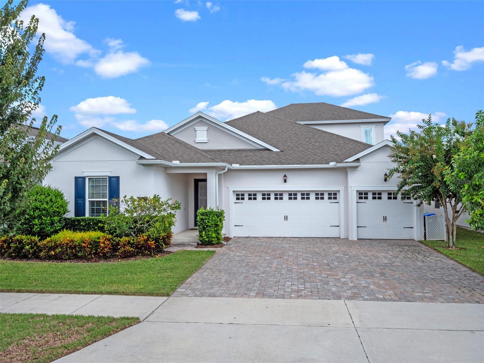 Welcome to this 3,097 square foot pool home in Sanctuary at Hamlin, located in the heart of Horizon West and just minutes from Hamlin Town Center. As you enter, two bedrooms share a full bathroom off the foyer, both featuring premium carpet and custom closets. The home then opens into a spacious dining and family room combination with 10-foot ceilings, wood-look tile flooring, and an accent wall.
The gourmet kitchen overlooks the main living area and includes Kenmore stainless steel appliances, with double ovens, refrigerator, and natural gas cooktop with hood and pot filler. The kitchen also offers extensive 42-inch cabinetry, a stylish backsplash, ample counter space, a large walk-in pantry, and an oversized quartz island with seating and pendant lighting.
The primary suite, accessed through double doors, is generously sized with views of the backyard. A custom barn door leads to the en suite bath, which includes dual vanities with a central makeup station, garden tub, walk-in shower, and two closets. The primary suite features custom closets as well. The first floor includes a third bedroom with pool views and a nearby full bath. Upstairs, you’ll find a private bedroom with en suite bath and a walk-in closet.
Step outside through the sliding door to an open-air patio overlooking the saltwater pool and spa, surrounded by paver decking. The open design offers a clean, unobstructed view of the Florida sky, with no rear neighbors for added privacy. A gas hookup is in place for a future summer kitchen.
Additional features include plantation shutters throughout, a downstairs laundry room, and a 3-car garage pre-wired for an electric vehicle charger. This home is conveniently close to Cinepolis, PopStroke, Orange County National Golf Center, restaurants, grocery stores, Orlando Health Horizon West Hospital, and Disney World, with easy access to SR-429 for commuting. Schedule your private showing today.