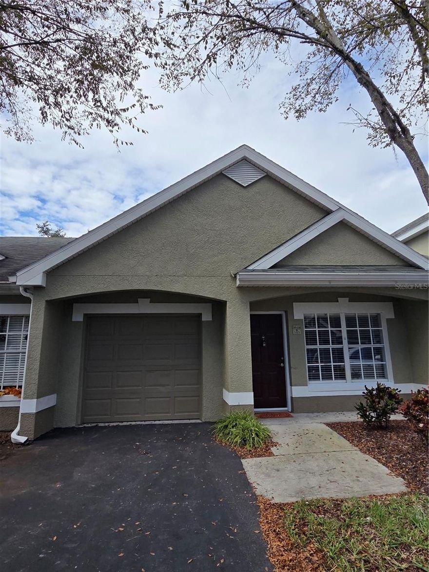 REOVATED, CLEAN AND READY to move in with attention to all the details taken care of. New bathroom vanities, new mirrors, new lighting, new plumbing fixtures including toilets.  Beautifully painted in Arctic light blue shade gives this condo a fresh and calming appearance.  Make this your  next home while living on the green space nearby the pool that you can walk to from your enclosed, screened patio with its gorgeous new tile floor.
Entire condo is a light shade of grey luxury vinyl plank flooring,  Easy to maintain and great to decorate with.  The entire garage has been painted semi-gloss  with a light grey painted floor.  Private mailbox kiosk on site, gated community, pet friendly w baggie stations, sidewalks to enjoy strolls all with a comfortable environment of safety experienced in Waterford Condominiums where every home owner has a garage..  Privately owned properties.  Walking distance to Publix, restaurants, shops and services and the Pinellas Trail, as well as John Chesnut Park for your enjoyment.  Sought after school area. Easy drive to Tampa International Airport and Clearwater St Pete Airport...both are within 20 to 30 minutes away.  MAKE AN APPT TO VIEW THIS LOVELY CONDO AND MAKE IT YOUR NEXT HOME.