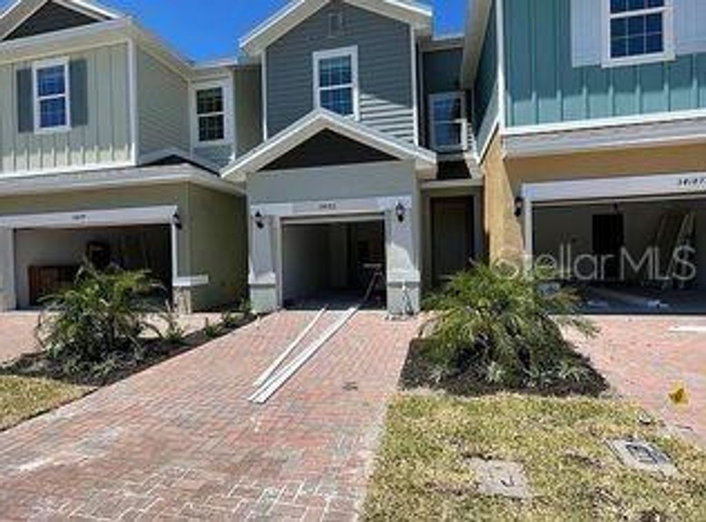 Photo of 34224 Rogallo Lane, Wesley Chapel, FL 33545 (MLS # O6392178)
