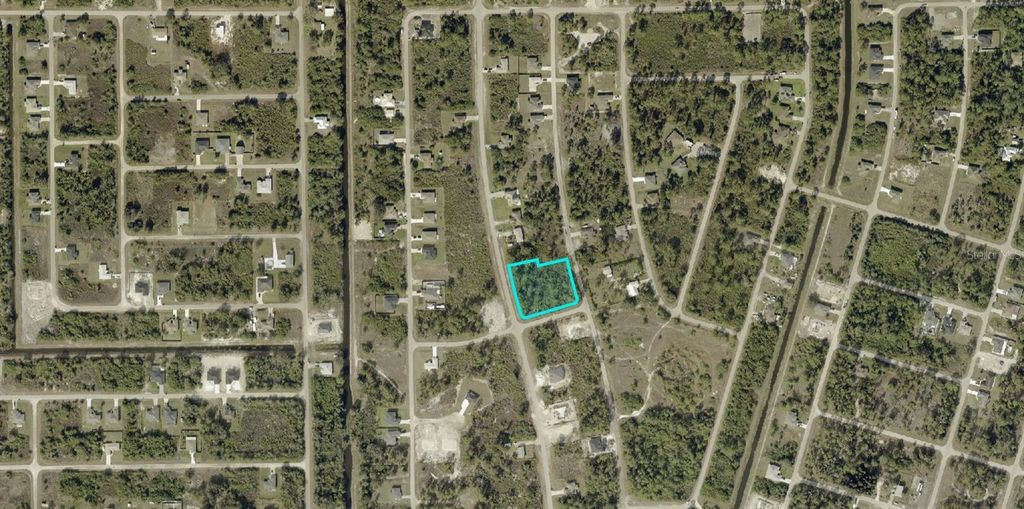 Photo of 531 Mcarthur Boulevard, Lehigh Acres, FL 33974 (MLS # A4689989)