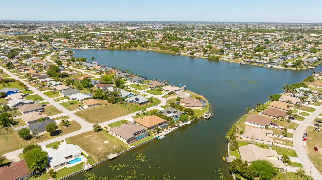 Photo of 613 SE 4th Place, Cape Coral, FL 33990 (MLS # TB8467764)