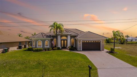 Photo of 613 SE 4th Place, Cape Coral, FL 33990 (MLS # TB8467764)