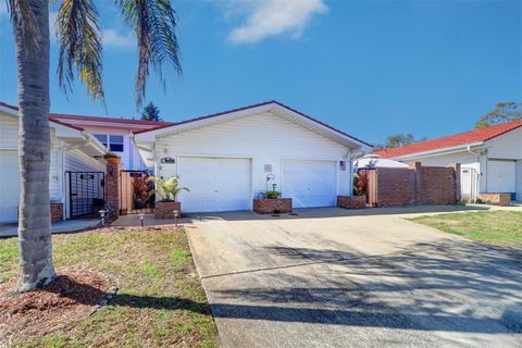 Photo of 1411 Water View Drive W, Largo, FL 33771 (MLS # TB8349469) Photo of 1411 Water View Drive W, Largo, FL 33771 (MLS # TB8349469)