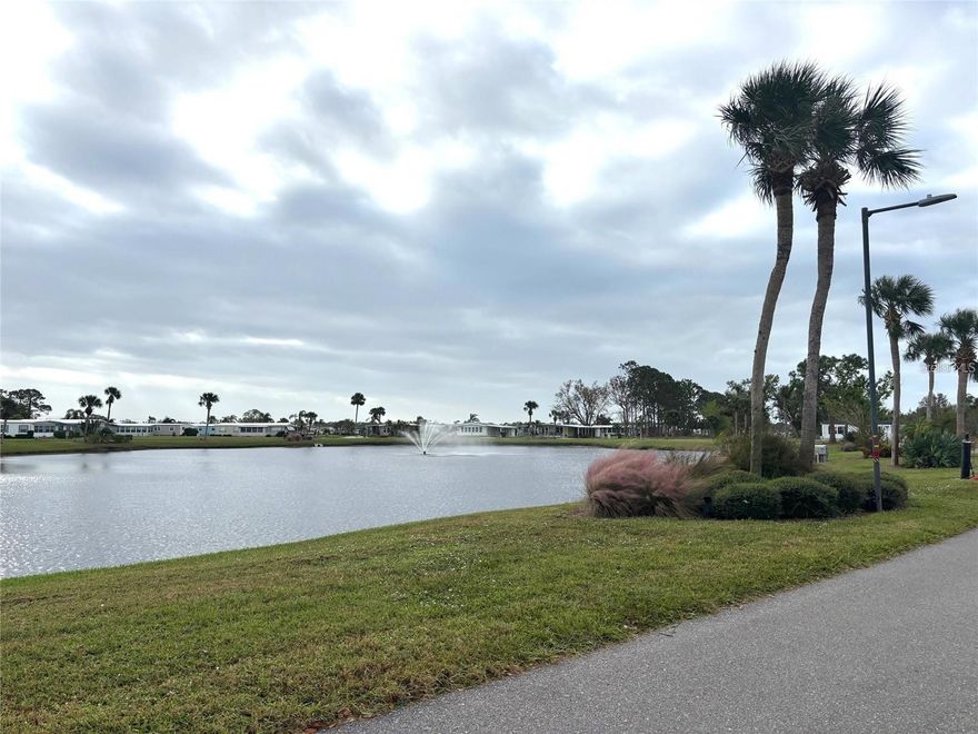 This corner lot offers a spectacular view of one of our 8 beautiful lakes. It is also located across from our Clubhouse so you'll be close to one of our pools, hot tubs, sauna, gym, library, and lots of other activities. La Casa offers the ultimate lifestyle on Florida’s Gulf Coast is located between Sarasota and Fort Myers.  It is convenient for shopping, sightseeing, golfing, fishing, and boating, as well as the culture and elegance for which Southwest Florida is noted. Residents and visitors enjoy the warmth of Southwest Florida winters in a relaxed and unhurried environment far removed from the hustle of Florida’s east coast. You’ll be surrounded by hundreds of palms reaching for the sky and beautiful mature lush landscaping which demonstrates the utmost level of care our property receives from residents and management.  Wireless Internet (Wi-Fi) is available at the Clubhouse, Activity Building, and Recreation Hall area where our pools & spas are located, so you can catch some rays while you catch up on your email! Sound enticing? La Casa is a friendly, family community. You will be away from the hustle and bustle except when you want to be part of it. When you leave our gates, North Port is only 1.5 miles from the city center, where you will find every kind of retail store and service you could need. Come for a visit to this self-contained oasis and see for yourself why La Casa is the ultimate destination for both snowbirds and year-round.