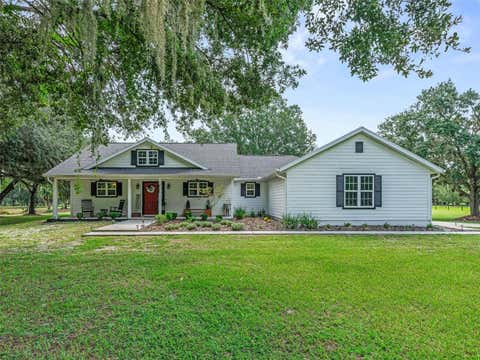 Photo of 1539 SE 34th Way, Summerville, FL 33585 (MLS # OM729236)