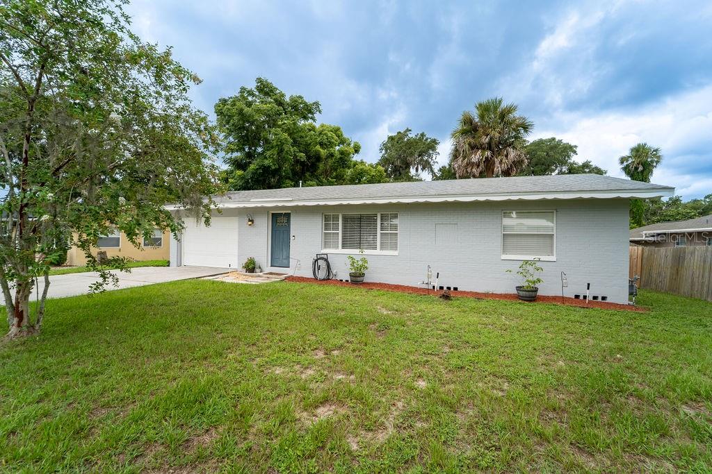 Welcome to this beautifully updated solid block home just under a mile from Stetson University and the vibrant, award-winning downtown DeLand. Whether you're looking for a private residence or an excellent investment opportunity, this home offers both comfort and convenience in a sought-after location. Step inside to find a thoughtfully remodeled kitchen featuring granite countertops, stainless steel appliances, and a gas range — perfect for the home chef. Original hardwood floors run through much of the home, refinished to highlight their timeless character and warmth. The freshly painted exterior, new roof (2020), new tankless water heater (2025), new A/C (2022) provide peace of mind, while the spacious, partially fenced backyard is ideal for relaxing or entertaining. Enjoy Florida living year-round on the expansive covered patio with a wooden deck and an above ground pool — a true outdoor retreat. With its prime location, modern updates, and classic charm, this home has so much to offer. Don’t miss your chance to make it yours!