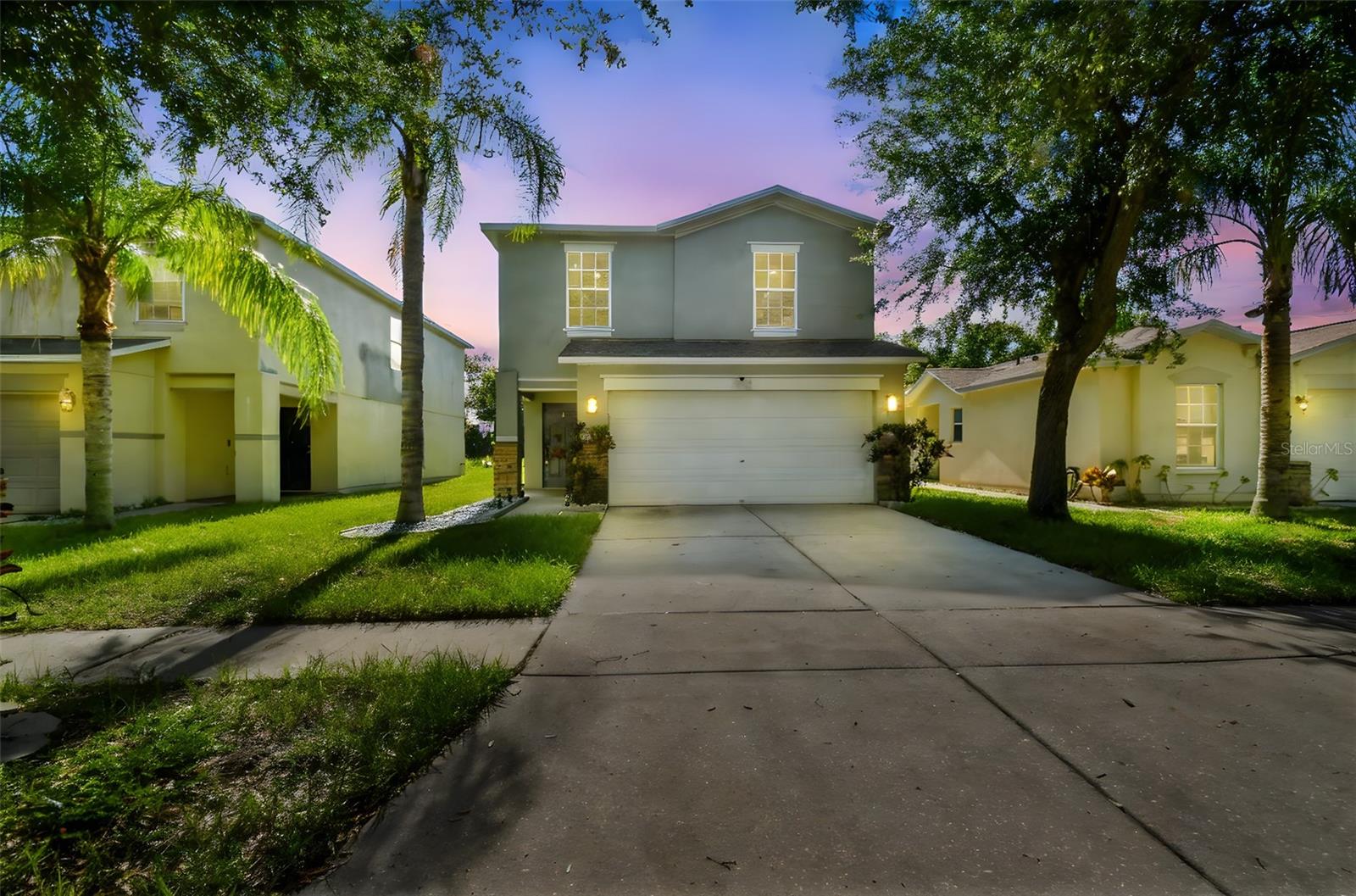 Modern Living with an Assumable Mortgage Awaits at 7842 Carriage Pointe Dr, Gibsonton!
Discover this beautifully updated two-story home in the desirable Carriage Pointe community. Offering 4 bedrooms, 2.5 bathrooms, and 2,050 sq ft of living space, this residence is designed for comfort and ease.
Step inside to a bright, open floorplan featuring new luxury vinyl flooring (2022) and high ceilings. The modern kitchen boasts shaker cabinets, granite countertops, stainless steel appliances, and a central island. Enjoy a spacious family room and a versatile den on the main level.
Upstairs, all four bedrooms offer privacy, including a large master suite with a custom accent wall and a spa-like bathroom. Functional upgrades include a new roof (2022), new AC (2022), and a new water heater (2023).
The property features leased solar panels (assumable lease), which can help manage monthly utility costs. A fully fenced backyard provides a private retreat with conservation views.
Residents of Carriage Pointe enjoy fantastic amenities: a swimming pool, gym, tennis courts, basketball courts, and a party room. Conveniently located with easy access to I-75, close to shopping, dining, and entertainment.