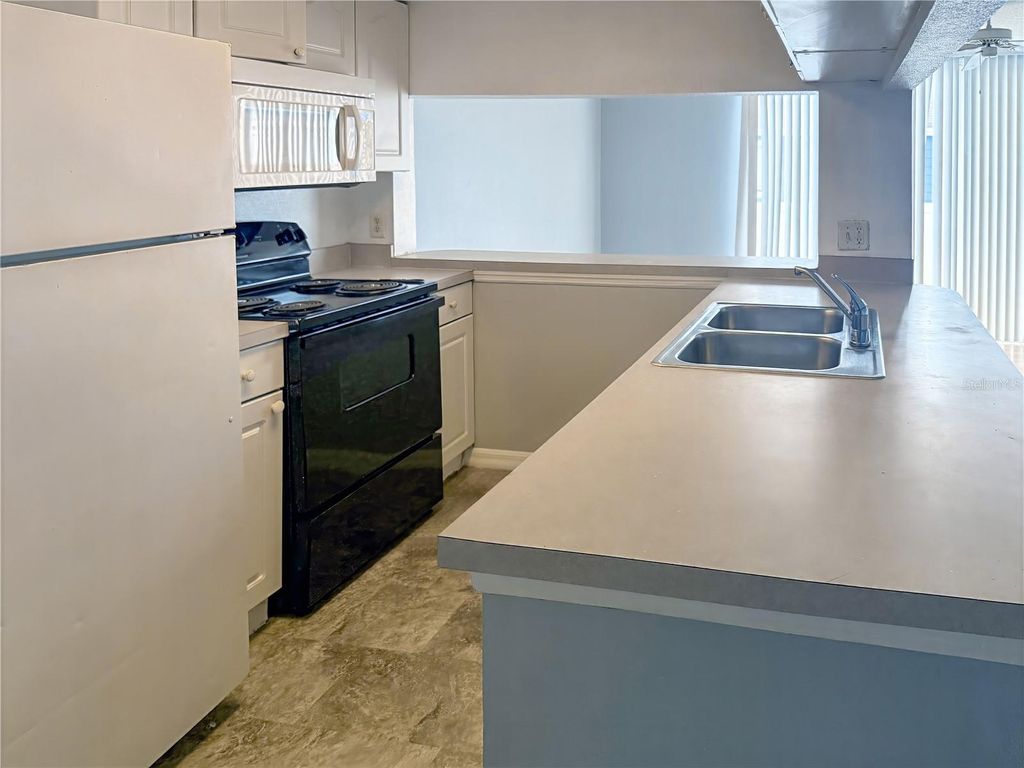 Photo of 515 Orchid Drive #A, Davenport, FL 33897 (MLS # S5138787)