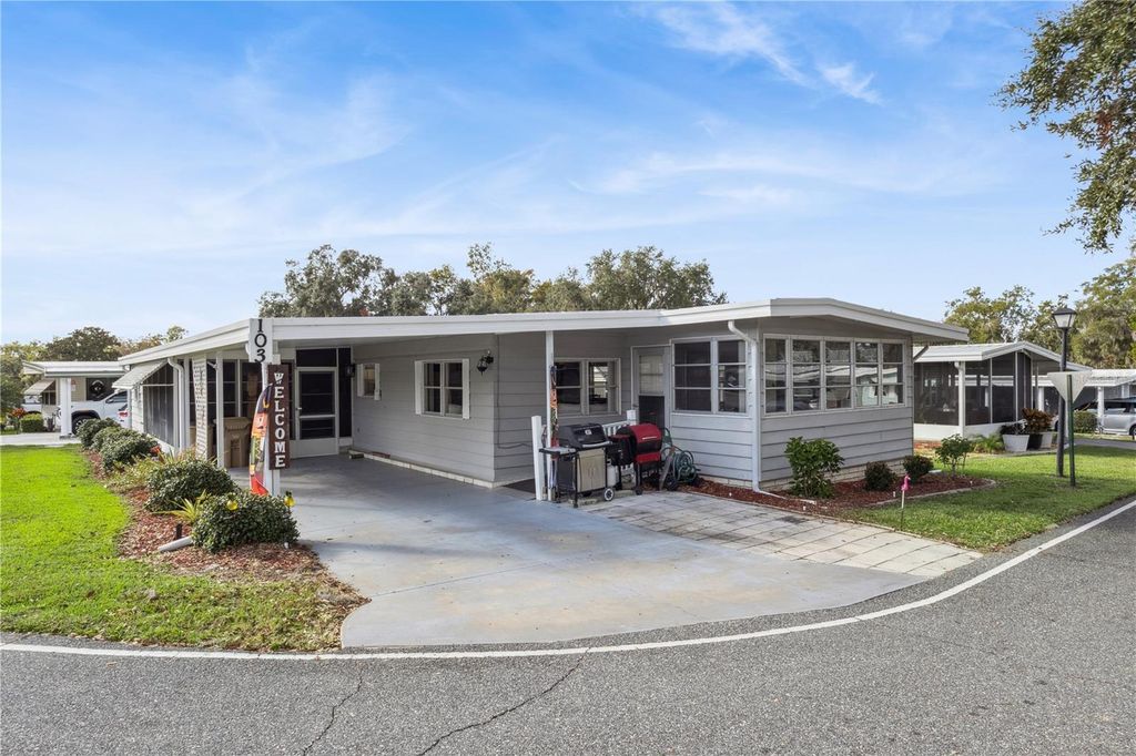 Photo of 103 Poinsettia Cv, Leesburg, FL 34748 (MLS # G5105622)