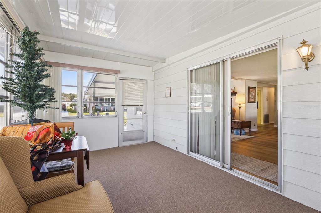 Photo of 103 Poinsettia Cv, Leesburg, FL 34748 (MLS # G5105622)