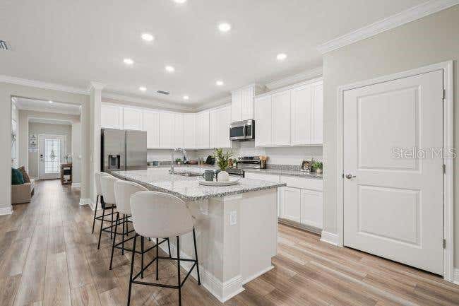 Photo of 3040 Sunscape Terrace, Groveland, FL 34736 (MLS # O6434622)