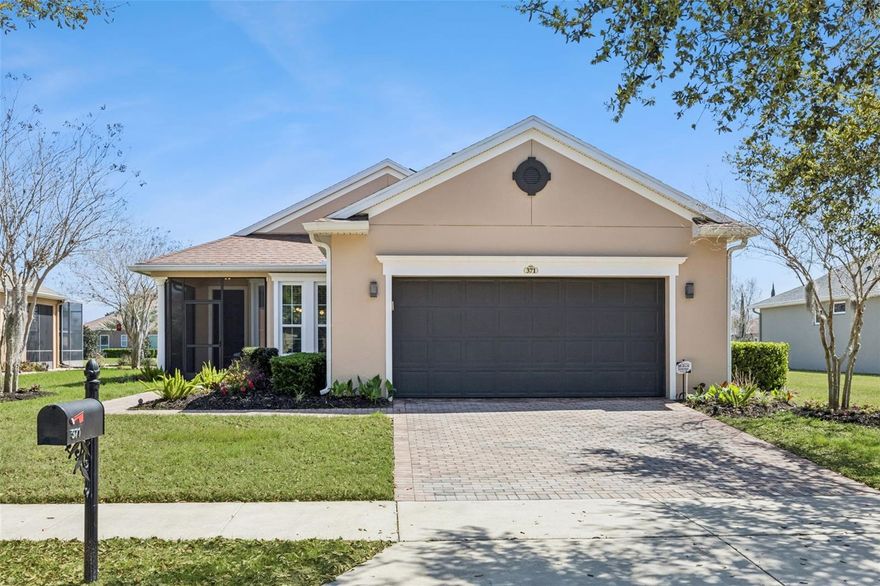 **This house comes with a REDUCED RATE through the seller's preferred lender. This is a lender-paid rate buydown that reduces the buyer's interest rate and monthly payment.**

Welcome to 371 Salt Marsh Lane in Groveland, located in a desirable 55+ community and offering a beautifully maintained home with thoughtful upgrades, energy efficiency, and access to outstanding community amenities.

Inside, you will find new porcelain tile flooring throughout the home along with updated light fixtures and ceiling fans that create a bright and modern feel. The renovated kitchen features appliances that are approximately four years old, a porcelain tile backsplash that extends under the peninsula and into the laundry room, and custom under-cabinet lighting for both style and functionality.

Additional interior upgrades include updated faucets, customized built-ins in the primary closet, and an added closet outside the guest bathroom that provides extra storage space.

The home also includes 26 fully paid-off solar panels, helping keep electric costs low. Exterior improvements include gutters and a screened-in front patio, perfect for relaxing and enjoying the Florida weather.

The HOA provides exceptional value and convenience, covering cable, internet, and landline service, a security system, landscaping, and access to community amenities including a pool, tennis and pickleball courts, and a fitness center.

This move-in ready home offers comfort, efficiency, and low-maintenance living in one of Groveland’s desirable communities.