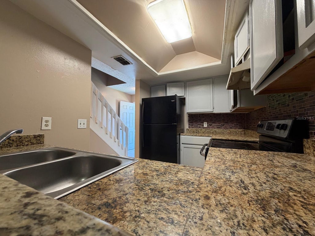 Photo of 1062 Jack Calhoun Drive, Kissimmee, FL 34741 (MLS # S5159959)