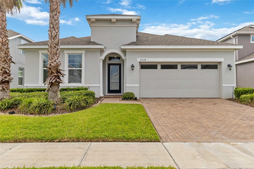Photo of 4334 Cypress Glades Lane, Orlando, FL 32824 (MLS # O6444261)
