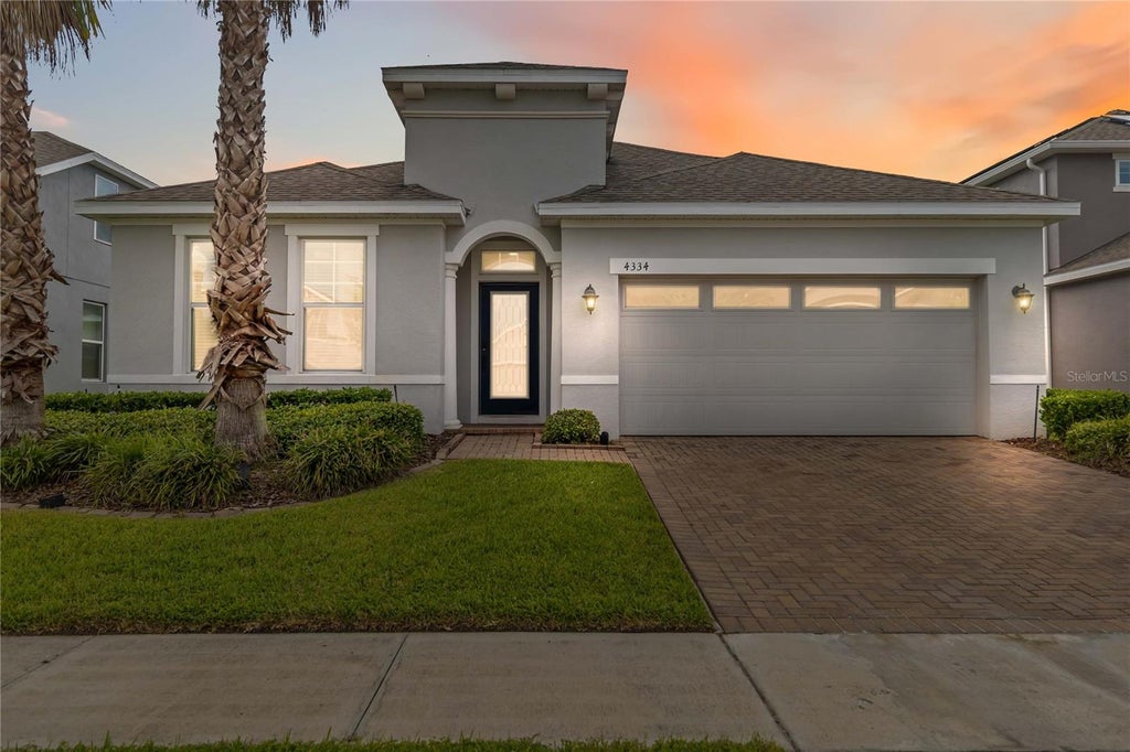 Photo of 4334 Cypress Glades Lane, Orlando, FL 32824 (MLS # O6444261)