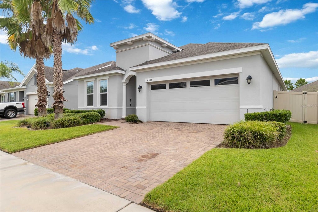 Photo of 4334 Cypress Glades Lane, Orlando, FL 32824 (MLS # O6444261)