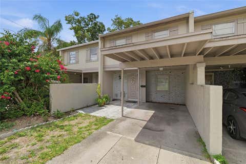 Photo of 5104 Tennis Court Circle, Tampa, FL 33617 (MLS # TB8519129)