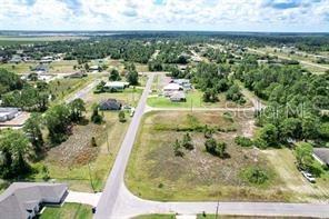 Photo of 1220 Fogia Street E, Lehigh Acres, FL 33974 (MLS # OM730132)