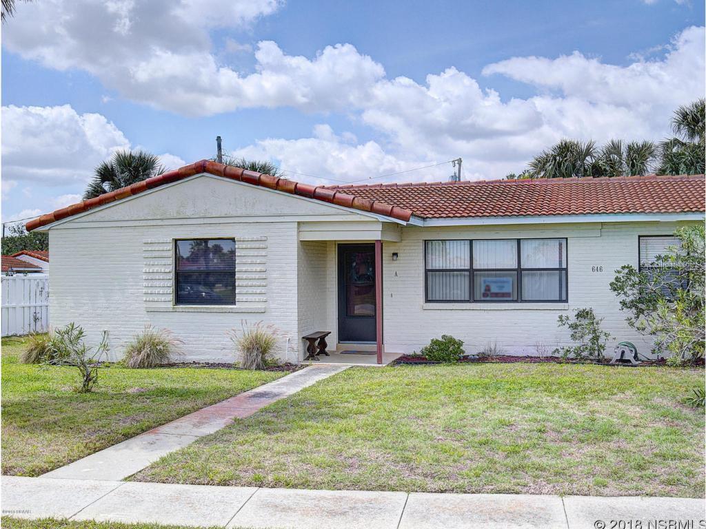 This is a must see adorable beach duplex.