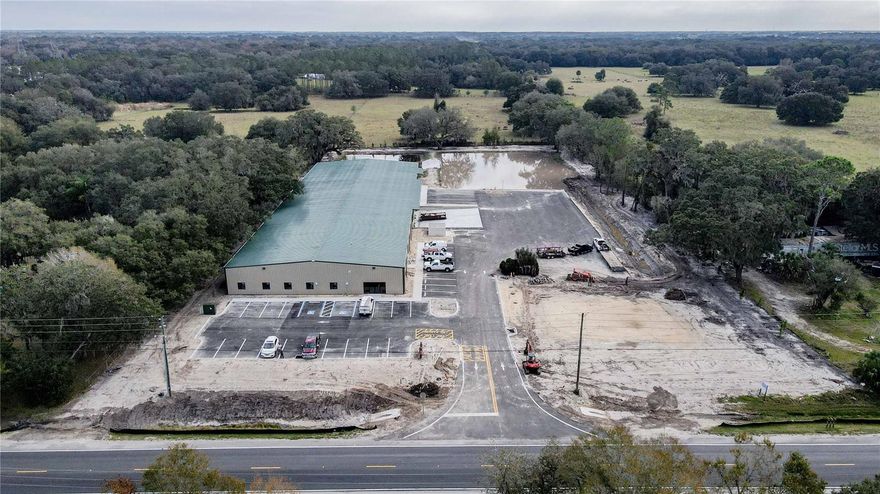 Under Construction. PRICE REDUCED $500,000! UPDATE - ONLY A FEW WEEKS AWAY FROM COMPLETION!! Clearspan Warehouse!  Under Construction! Slab is poured, beams are up and construction is underway on this 30,000 sqft Warehouse neighboring The Villages Southern Expansion. Located directly on US Hwy 301 just North of Sumterville and Coleman areas, this location is PRIME with easy access to the Florida Turnpike and Interstate 75. This site and build consist of 330’ of US Highway 301 frontage with 3,158 sqft of office space under air (5 large offices, a breakroom, a showroom, and 6 bathrooms) and 26,842 sqft of Clearspan Warehouse that includes Five 12x12 loading bays (Two Grade Level and Three Dock High).  The Curved Eave height is 12.7’ with the Ridge Line expanding to 17.5’ in height providing an abundance of storage space for racking and open work areas.  The property is comprised of 4.62+/- acres with 30 parking spaces.  Zoned Industrial, this property is sought-after in the area given the low availability of warehouse/office space and provides a great opportunity to a plethora of businesses that want to be close to The Villages.  Call or email today with any questions or to tour the site.  *Do not tour the site without an appointment, as this is a hard hat area*