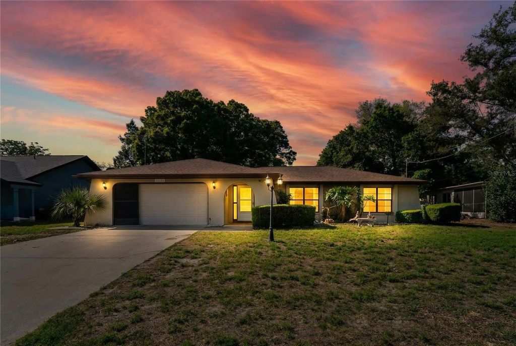 Photo of 11122 Maderia Street, Spring Hill, FL 34609 (MLS # W7884880)