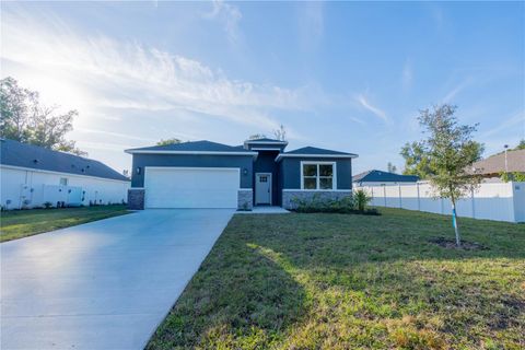 Photo of 911 N New Hampshire Avenue, Tavares, FL 32778 (MLS # O6371717)