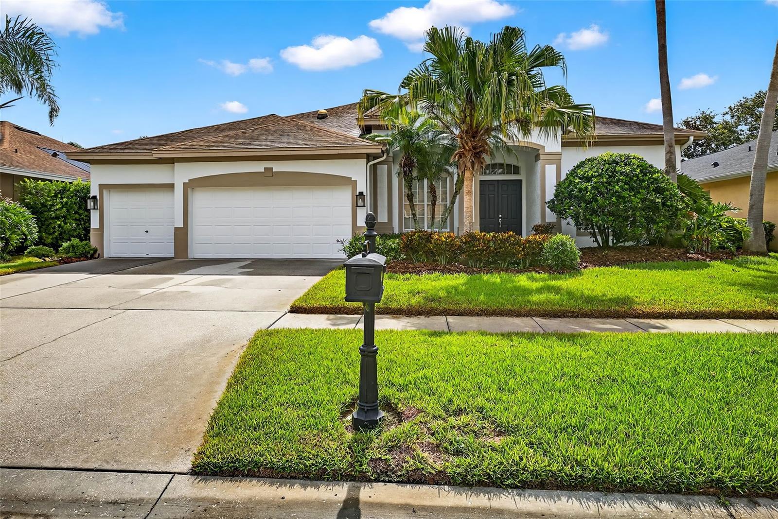 Welcome home to BRENTFORD - one of the most sought-after neighborhoods within Tampa’s premier master-planned GOLF community of Westchase. There is room to relax and unwind in this 2618-square foot POOL/SPA home that includes 4 bedrooms, 3 baths, a SEPARATE OFFICE/DEN, and a 3-car garage. Upon entry, you’ll discover a generously sized formal living and dining space that flows effortlessly into the kitchen and family room where you will enjoy a GAS FIREPLACE and sweeping views of the FENCED BACKYARD and pool lanai. The UPDATED KITCHEN offers on-trend cream cabinetry, GRANITE COUNTERTOPS, a BREAKFAST BAR, an EAT-IN SPACE, a CLOSET PANTRY and STAINLESS-STEEL APPLIANCES including a WINE CHILLER and a BRAND-NEW 5- BURNER GAS COOKTOP. The Primary Suite, with access to the pool, features a double tray ceiling, room for a sitting area, TWO WALK-IN CLOSETS, and a separate tub and shower. The spacious, PAVERED pool lanai extends your living space for year-round enjoyment and allows plenty of room for your dining and lounge furniture. As a resident of Westchase, you will not only enjoy close proximity to ample shopping and dining establishments, but also two Olympic-sized community pools, tennis/pickleball courts, two parks, and miles of sidewalks for exercising. Convenient to Tampa International Airport, the Westshore Business District, and the Pinellas County Beaches. Zoned for Alonso High School which offers an International Baccalaureate (IB) Program.